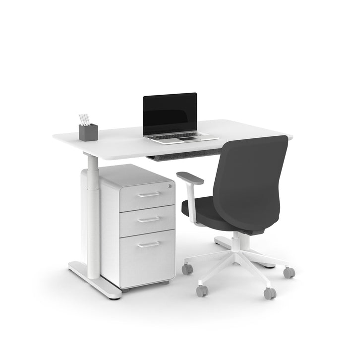 Modern office desk with ergonomic chair, laptop, and mobile drawer unit on white background. (White-48&quot;)