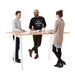 Three colleagues engaging in a casual meeting around a white table on a white background. (Natural Oak-72&quot; x 36&quot;)(Natural Oak-72&quot; x 36&quot;)