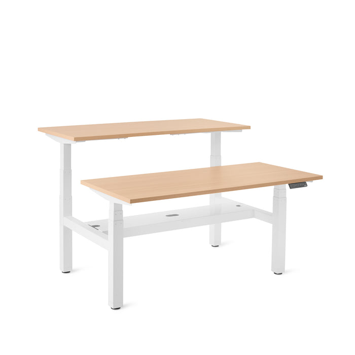 Adjustable height modern desk with wood finish top on white background. (Natural Oak-57&quot;)