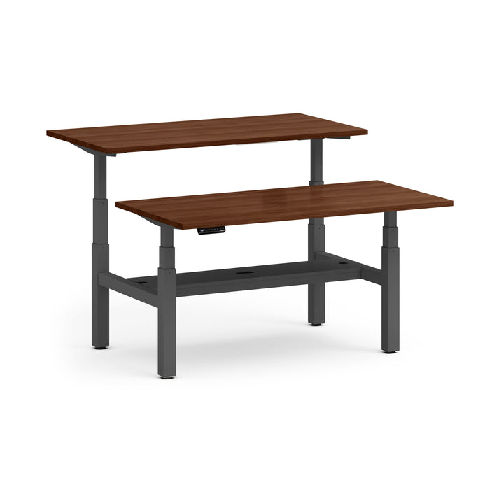 Adjustable standing desk with wooden top and grey frame on a white background. (Walnut-60&quot;)