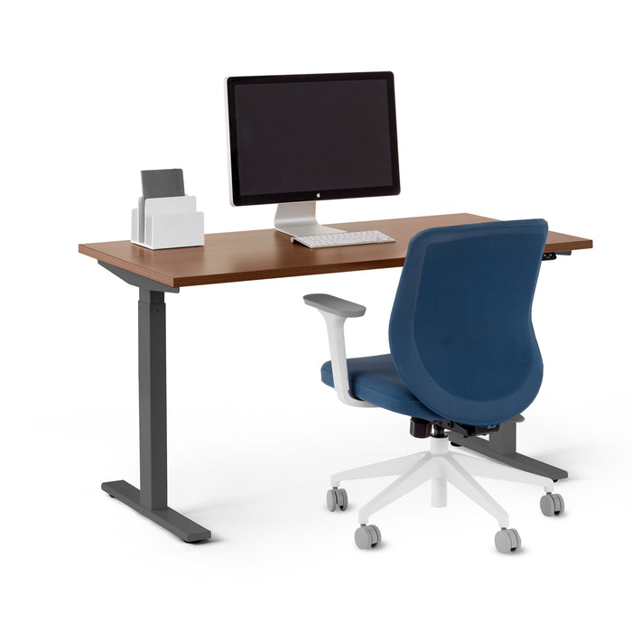 Modern office desk with computer monitor and blue ergonomic chair on white background. (Walnut-47&quot;)