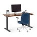 Modern office desk with computer monitor and ergonomic blue chair on white background. (Walnut-57&quot;)