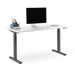Modern standing desk with computer, keyboard, mouse, and office supplies against a white background. (White-57&quot;)