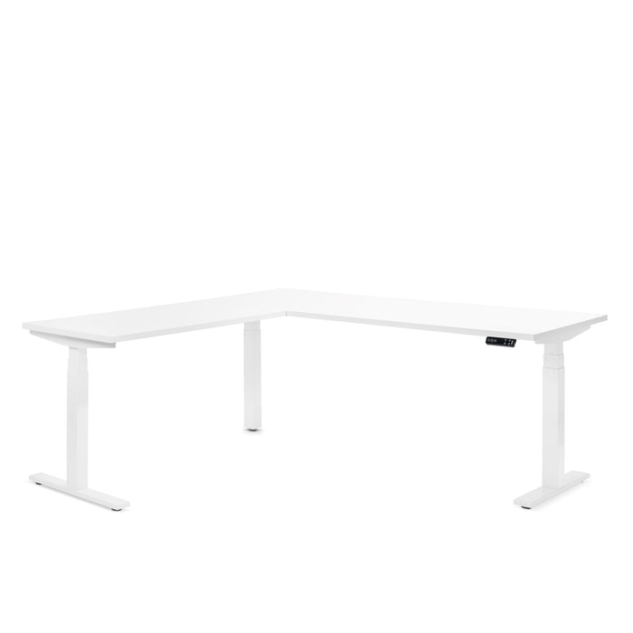 White L-shaped modern adjustable standing desk isolated on a white background. (White)