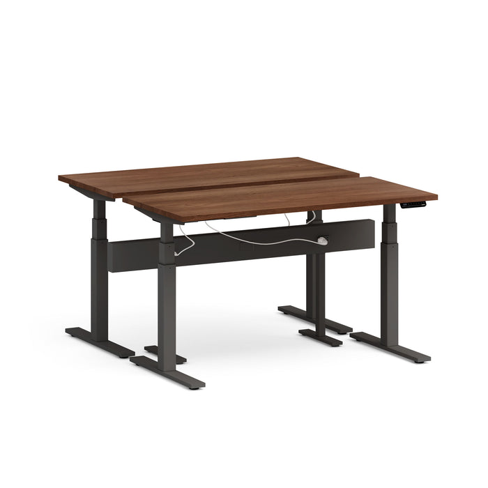 Adjustable height desk with wooden top and black frame on a white background. (Walnut-57&quot;)