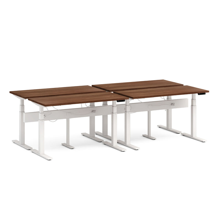 Modern adjustable standing desks with dark wood tabletop and white frame. (Walnut-57&quot;)