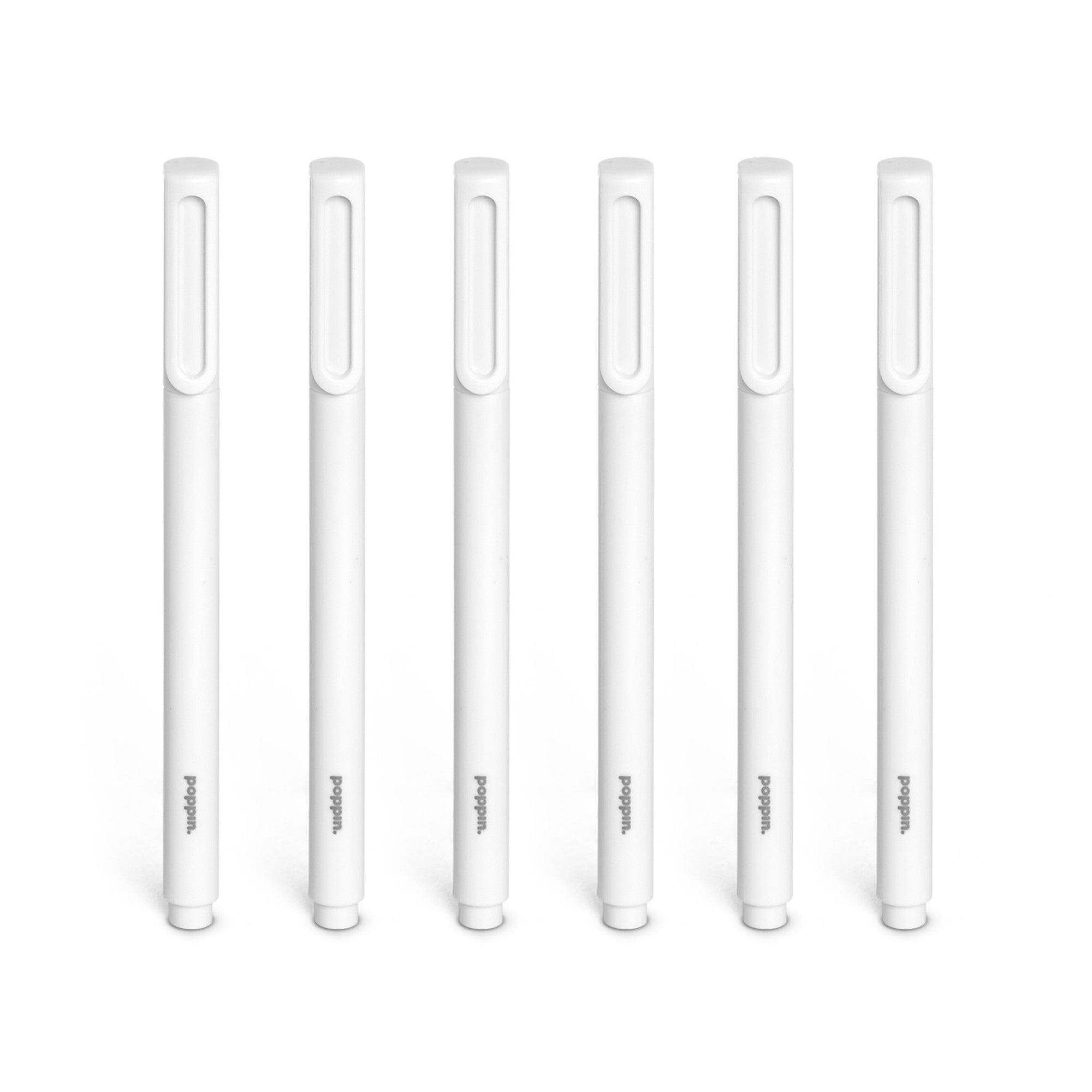 Collection of eight white stylus pens in various sizes isolated on white background. 