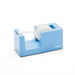 Blue Poppin brand tape dispenser with white tape on a white background. (Sky)