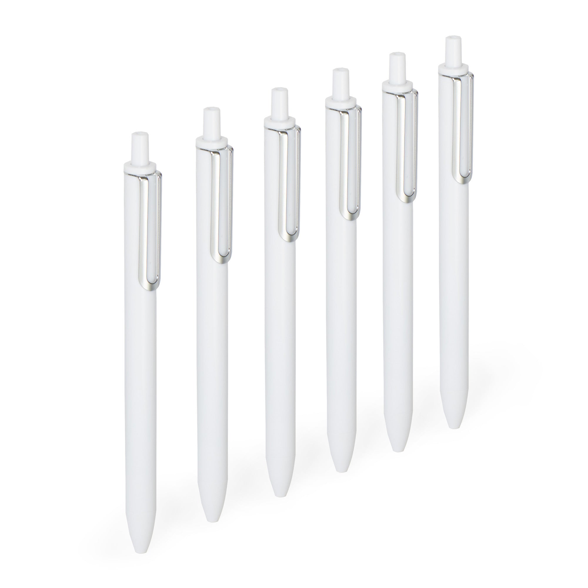 "Set of white pens with silver clips arranged in a row on a white background 