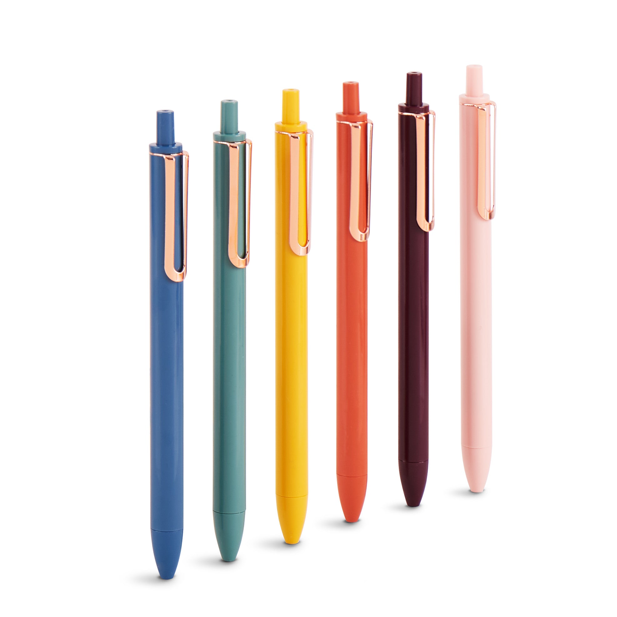 Colorful assortment of pens standing vertically on a white background. 