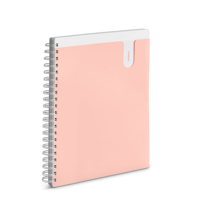 Spiral notebook with pink cover and white binding isolated on a white background. (Blush-3 Subject)