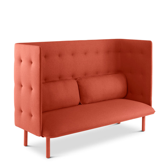 Modern orange two-seater tufted sofa on a white background. (Brick-Brick)