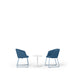 Two blue modern chairs with a small white table on a white background. (Dark Blue)