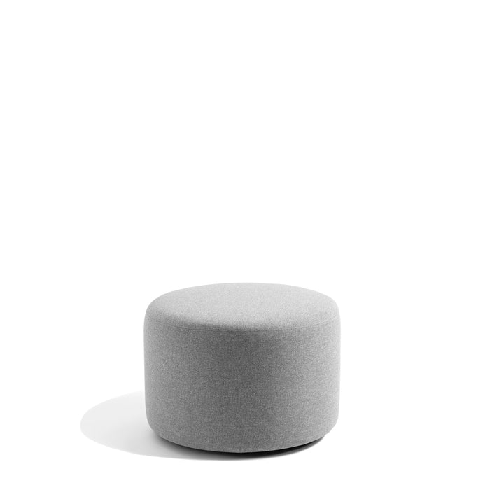 Gray fabric round ottoman on a white background. (Gray)