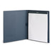 Navy blue Poppin padfolio with writing pad open on white background. 