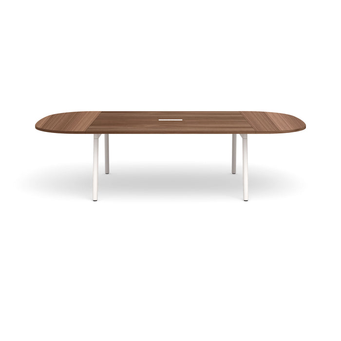 Modern oval wooden coffee table with white legs on a white background. (Walnut-114&quot;)