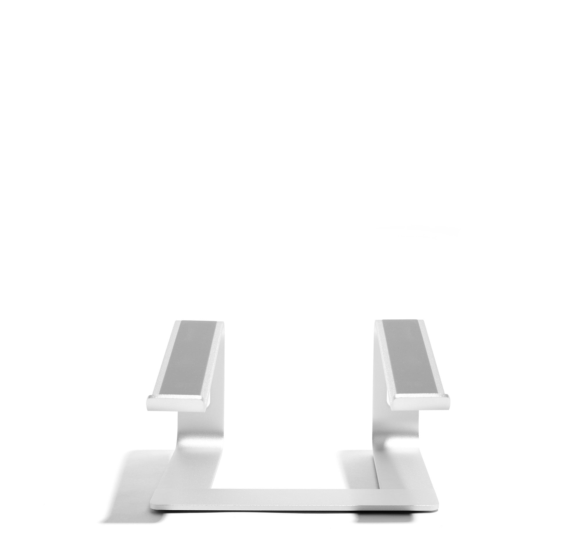 Minimalist modern white double shelf on a white background. 