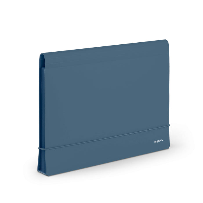 Blue hardcover notebook standing upright on a white background. (Slate Blue)