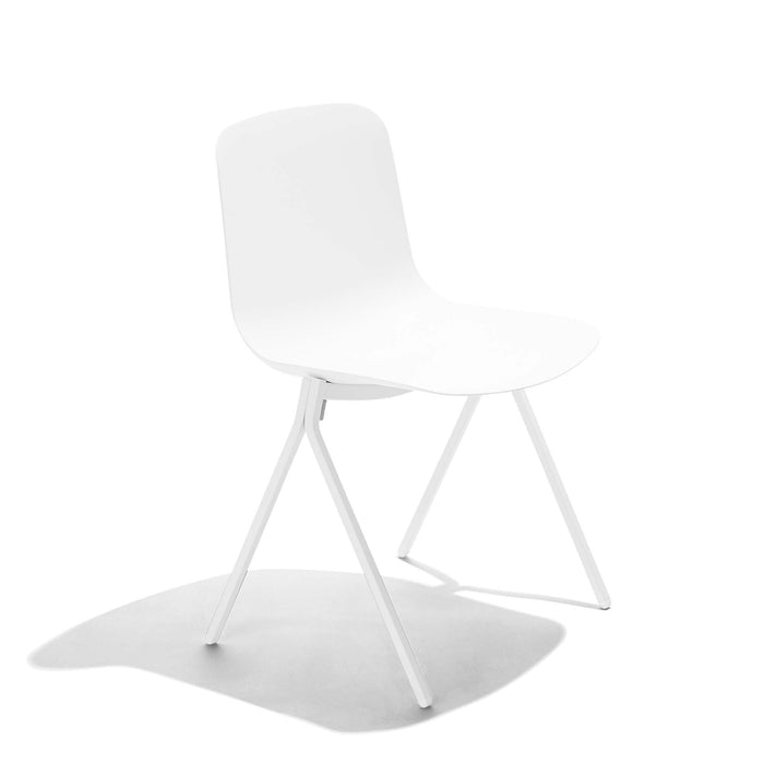 Modern white chair on a white background with a soft shadow under the seat. (White)