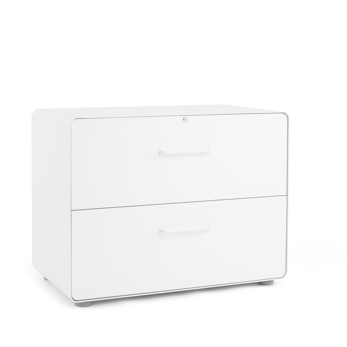 Modern white two-drawer filing cabinet isolated on a white background. (White)