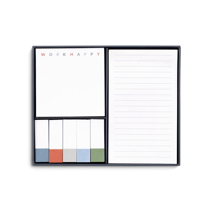 Open notepad with "WORK HAPPY" text and colorful sticky notes on white background. 