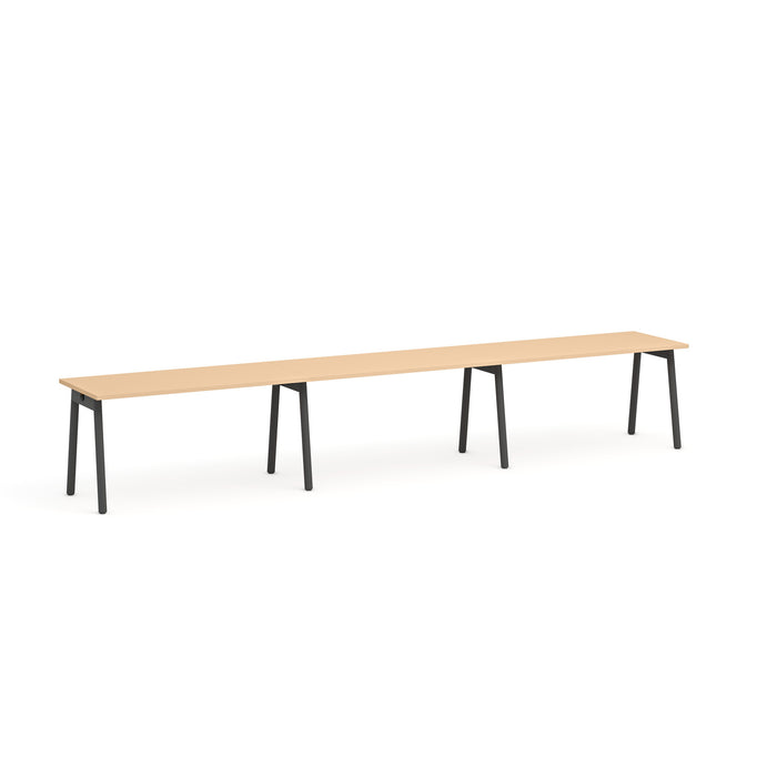 Modern long wooden table with black legs on a white background. (Natural Oak-57&quot;)